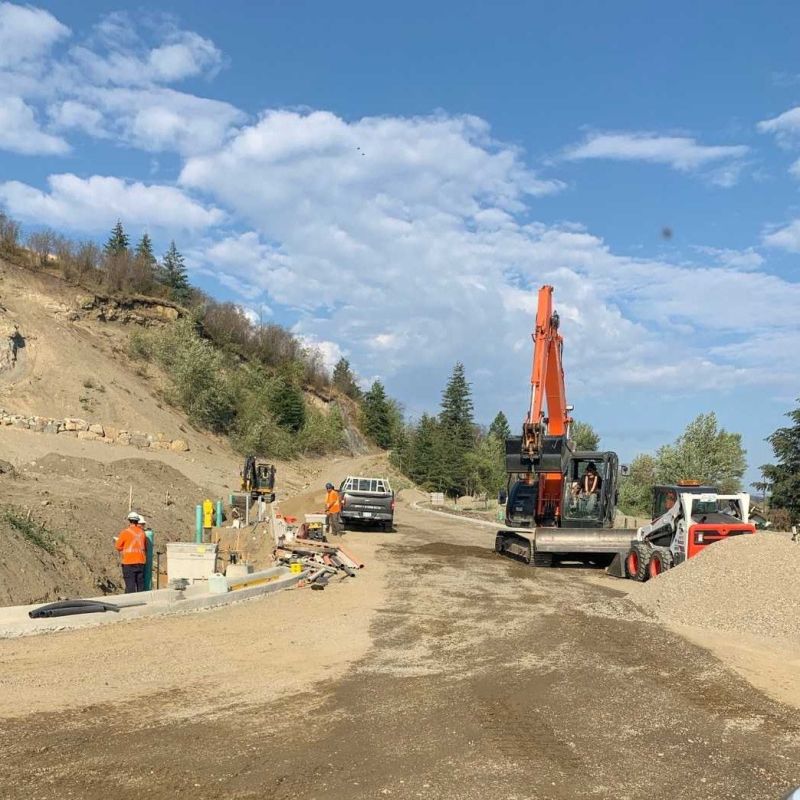 Construction vehicles and personnel at Morningview construction site